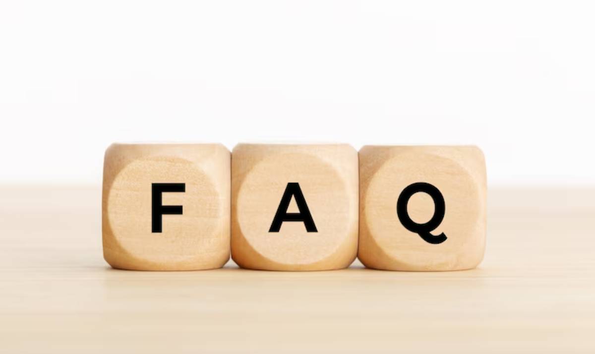 Three wooden blocks displaying the letters FAQ representing the acronym for Frequently Asked Questions.